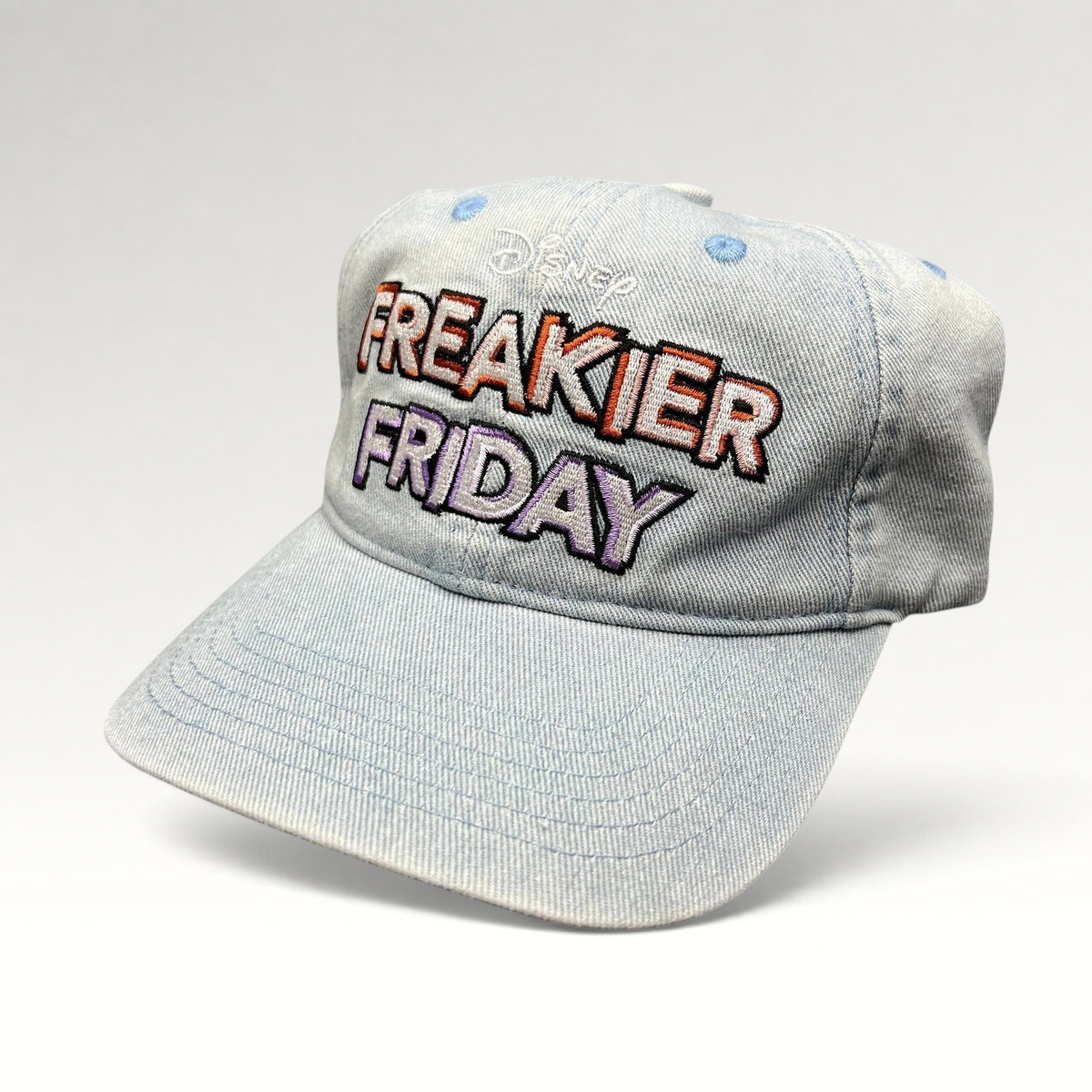 Raree Finds Disney Freakier Friday light blue washed cotton dad hat with multicolor embroidered movie logo.