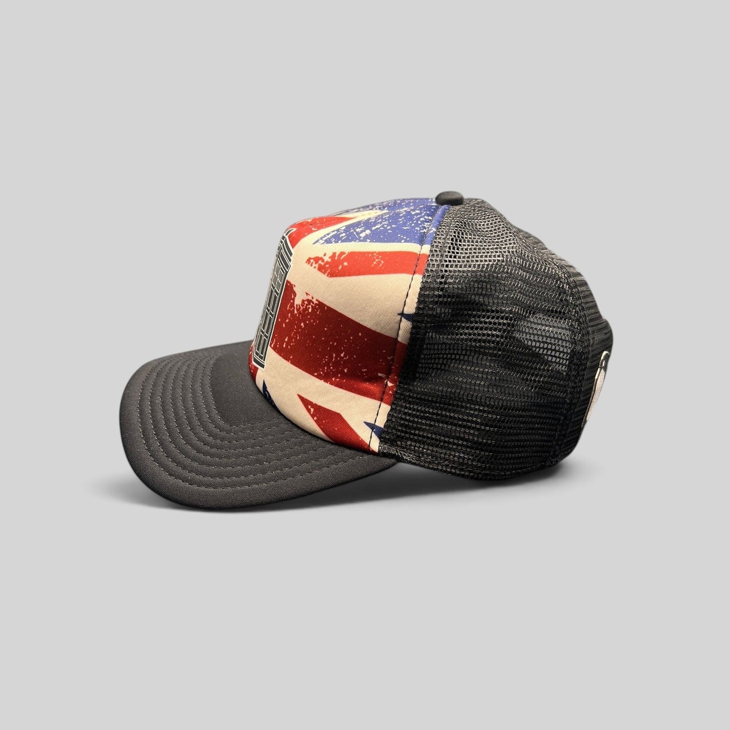 Raree Finds Doctor Who TARDIS trucker hat with a distressed Union Jack front panel, black bill, and mesh back.