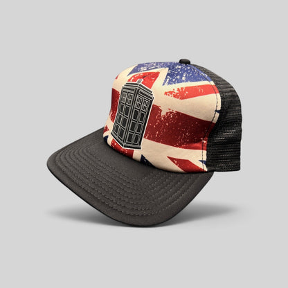 Raree Finds Doctor Who trucker hat with a TARDIS graphic on a distressed Union Jack front and black mesh back.