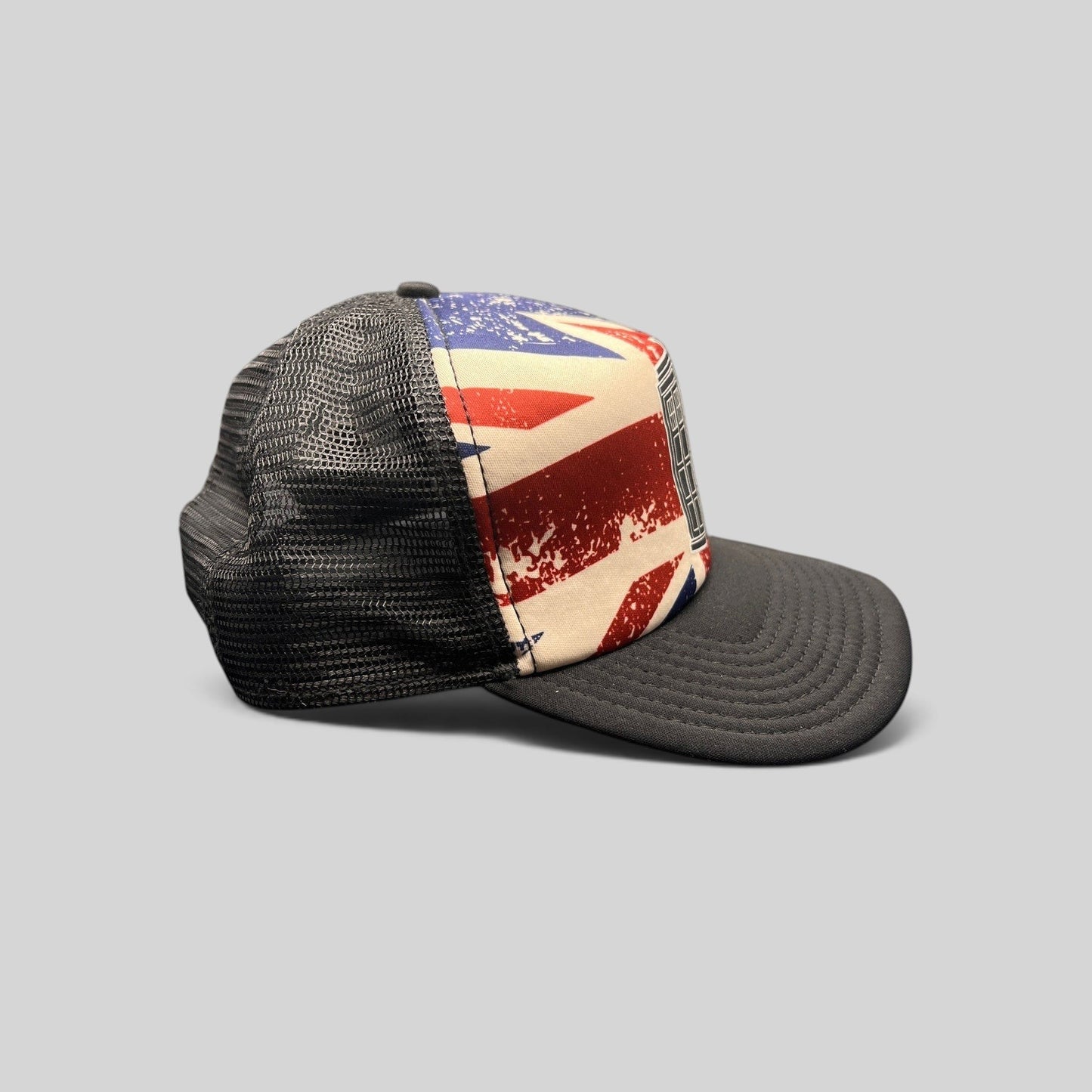 Raree Finds Doctor Who TARDIS trucker hat with a distressed Union Jack front panel, black bill, and mesh back.