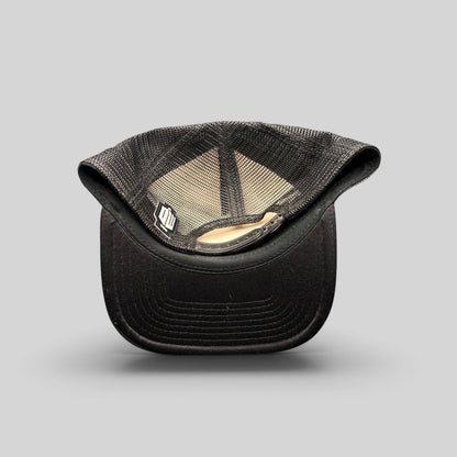 Raree Finds Doctor Who trucker hat showing the interior black mesh lining, adjustable snapback, and woven brand label.