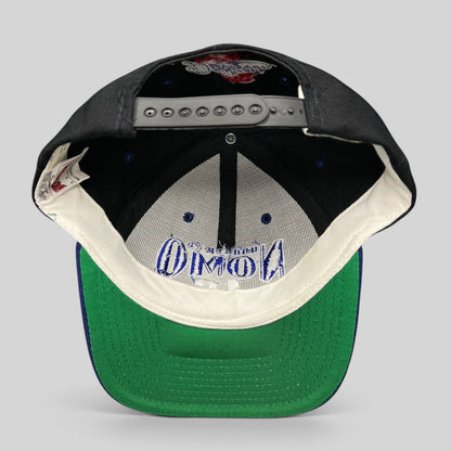 Raree Finds vintage 90s Los Angeles Dodgers Hideo Nomo snapback hat showing black crown, green undervisor, and snapback