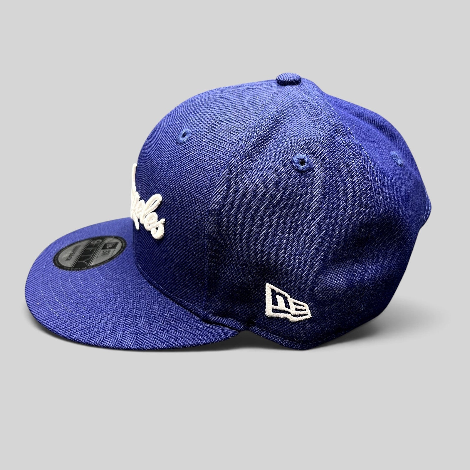 Raree Finds Los Angeles Dodgers royal blue New Era 9FIFTY snapback hat with white script embroidery and flat visor