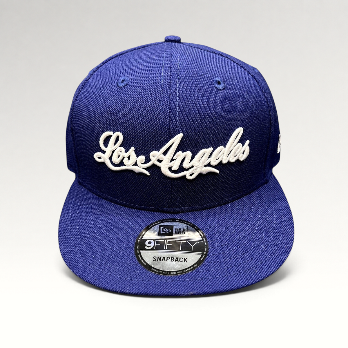 Raree Finds Los Angeles Dodgers royal blue 9FIFTY snapback hat with white raised script embroidery and flat visor