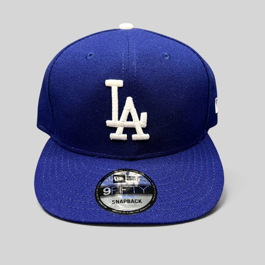 Raree Finds royal blue New Era 9FIFTY Los Angeles Dodgers snapback hat with a raised white LA logo on the front.