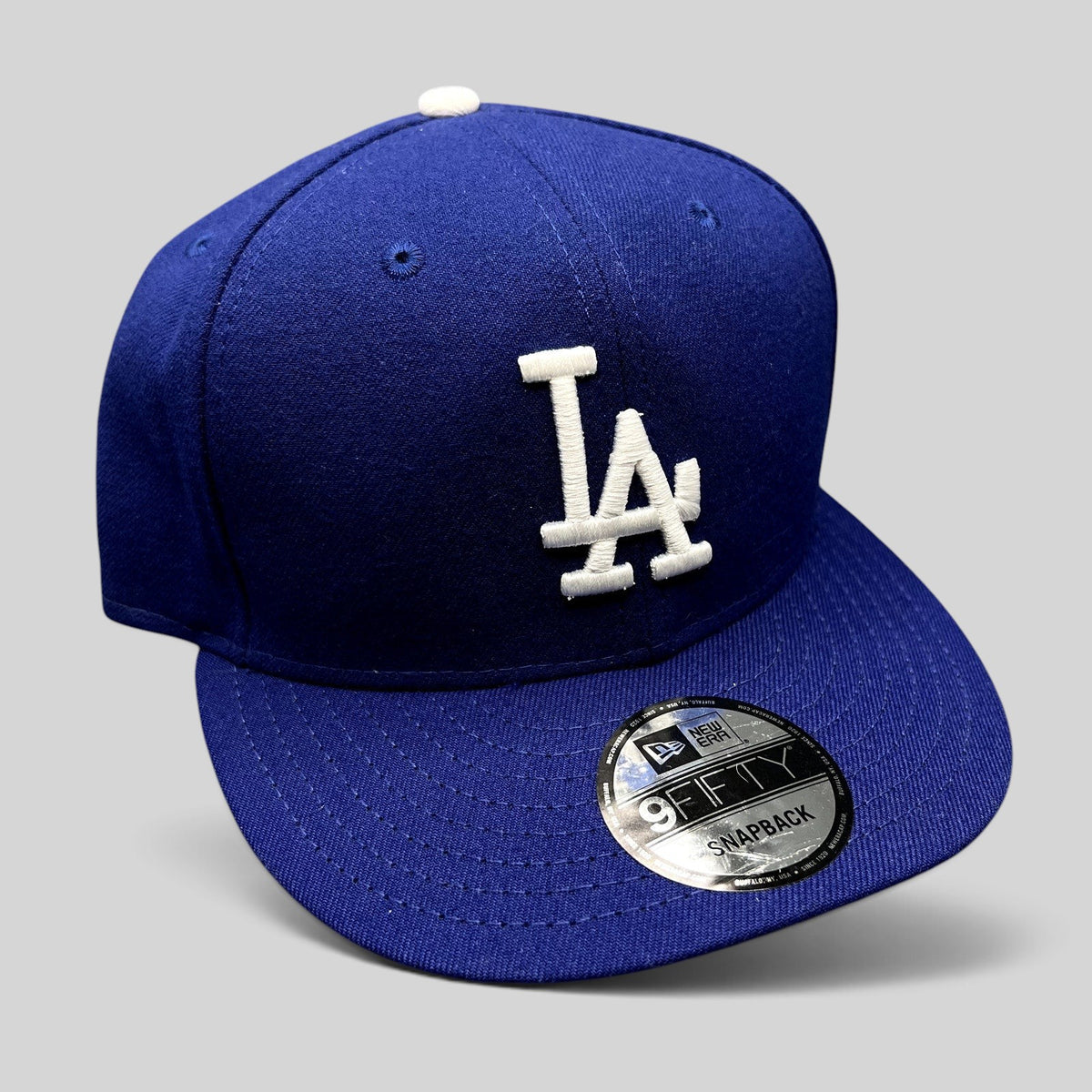 Raree Finds royal blue Los Angeles Dodgers New Era 9FIFTY snapback hat with white LA logo and brim sticker