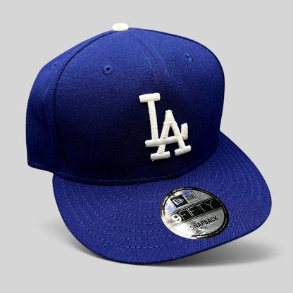 Raree Finds royal blue Los Angeles Dodgers New Era 9FIFTY snapback hat with white LA logo and brim sticker
