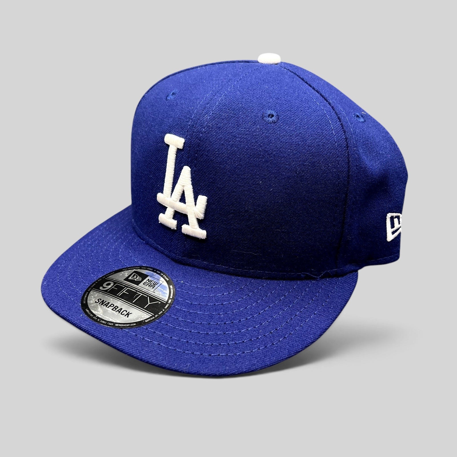 Raree Finds royal blue New Era 9FIFTY Los Angeles Dodgers snapback hat with raised white LA logo and brim sticker