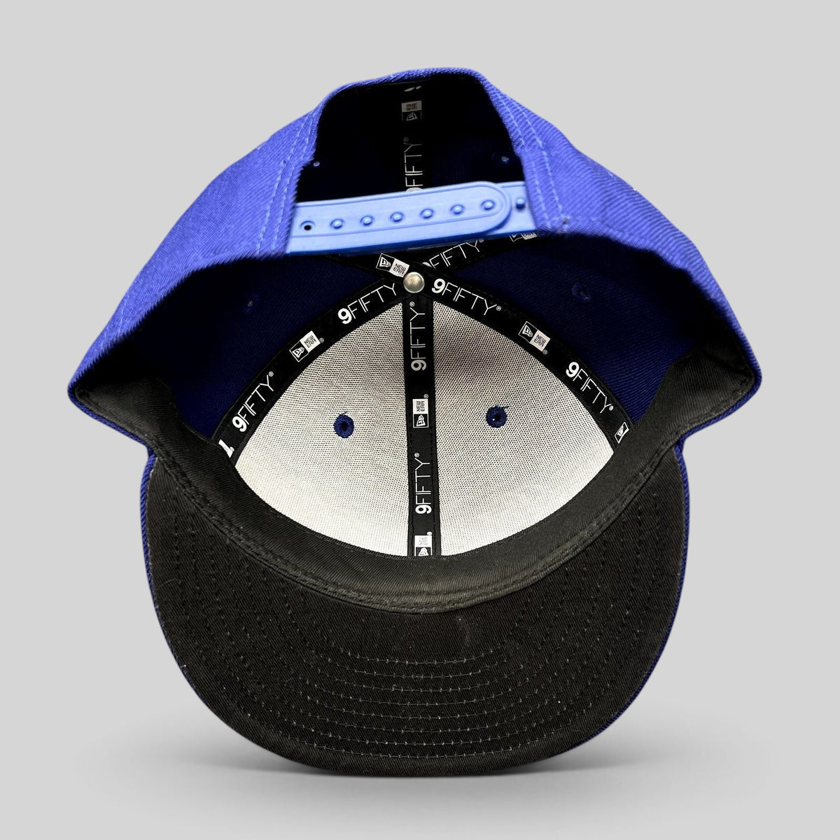 Raree Finds Los Angeles Dodgers New Era 9FIFTY snapback hat interior view showing royal blue crown and black visor