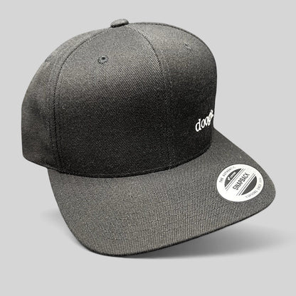 Raree Finds black Doogie Kamealoha M.D. snapback hat with white embroidered logo and Yupoong sticker on flat brim
