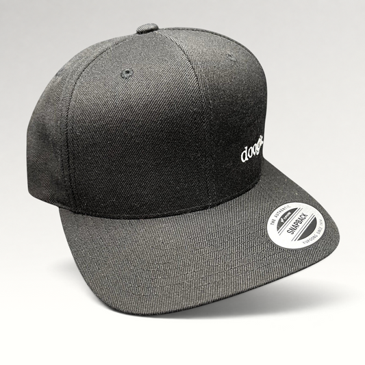 Raree Finds black Doogie Kamealoha M.D. snapback hat with white embroidered logo and Yupoong sticker on flat brim