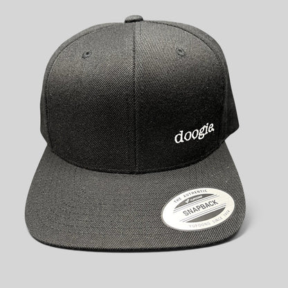 Raree Finds black Doogie Kamealoha M.D. snapback hat with embroidered white doogie logo on front