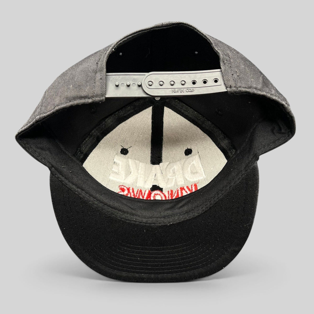 Raree Finds vintage black snapback hat with 3D embroidered Drake Knows text in white and red, rear view.