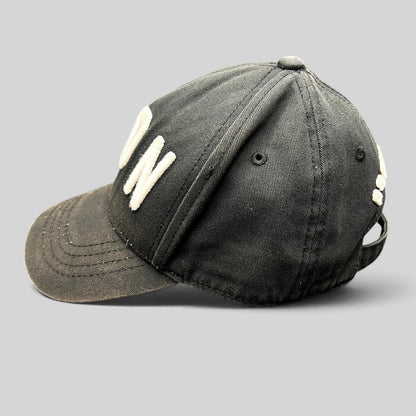 Raree Finds black DSQUARED2 ICON strapback hat with raised white embroidery and a curved brim in designer streetwear.