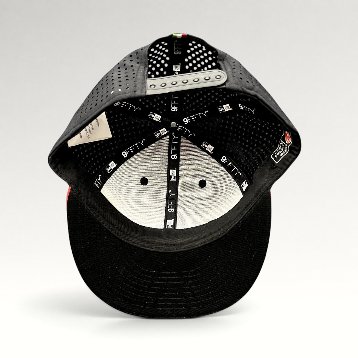 Raree Finds Ducati x New Era 9FIFTY snapback interior showing perforated panels, branded taping, and flat brim
