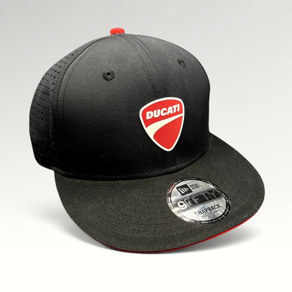Raree Finds black New Era 9FIFTY Ducati snapback cap with a red shield logo, perforated panels, and flat brim.