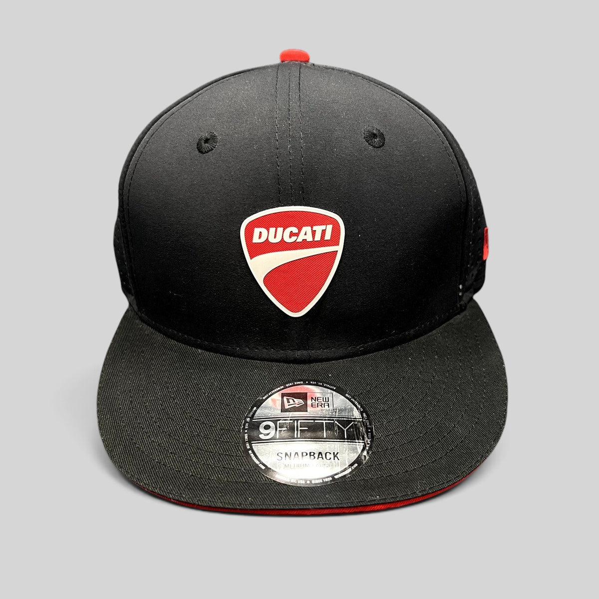 Raree Finds black Ducati 9FIFTY snapback hat with red shield logo, flat brim, and adjustable rear snap closure.
