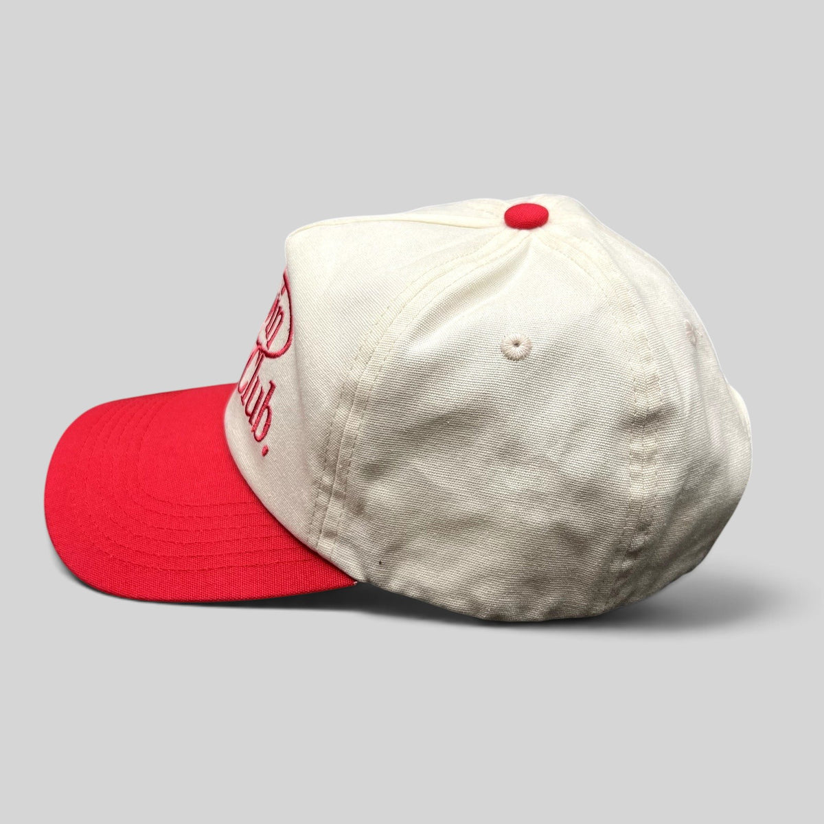 Raree Finds Duvin Beach Club snapback hat in cream and red cotton with an embroidered logo and curved bill.