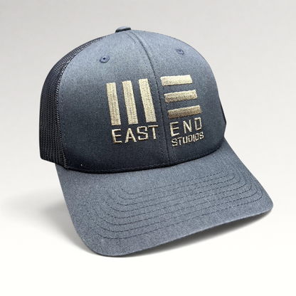 Raree Finds navy blue East End Studios trucker snapback hat with embroidered logo and breathable mesh back panels