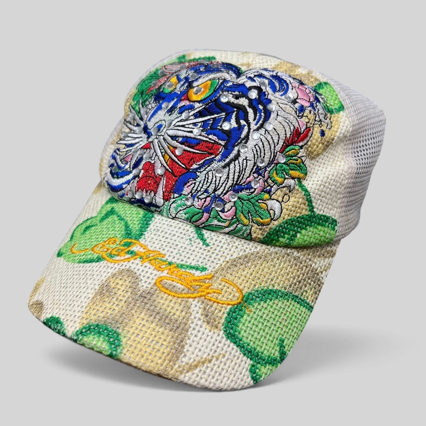 Raree Finds vintage Don Ed Hardy Y2K trucker hat with embroidered tiger graphic, rhinestone details, and mesh back.