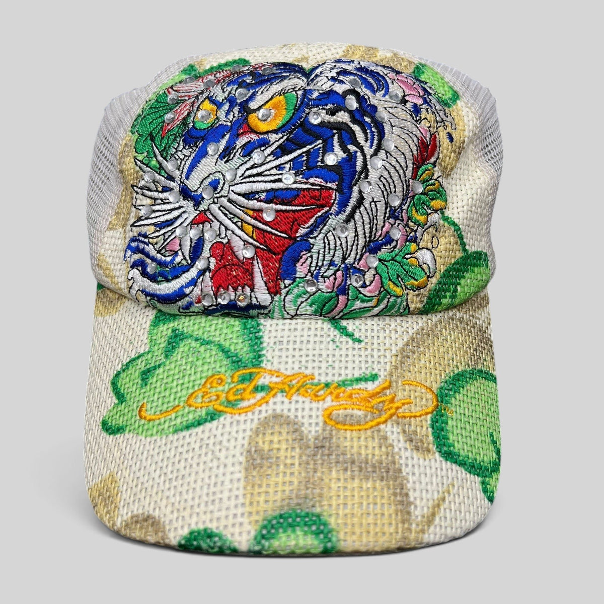 Raree Finds vintage Don Ed Hardy Y2K trucker hat featuring a vibrant embroidered tiger graphic with rhinestone accents