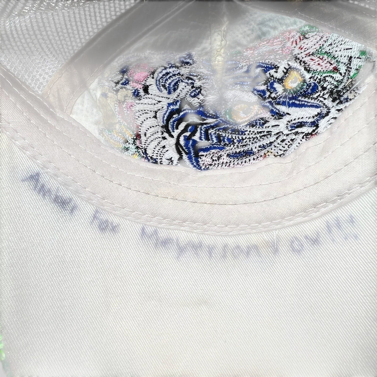 Raree Finds vintage Don Ed Hardy trucker hat with embroidered tiger graphic and rhinestone details on canvas brim