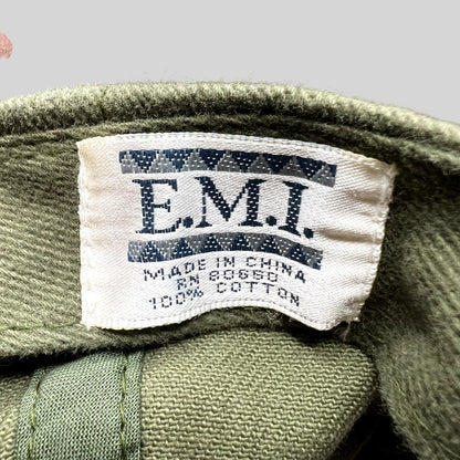 Raree Finds vintage EMI brand tag inside an olive green cotton hat from the Grand Canyon Squire Inn