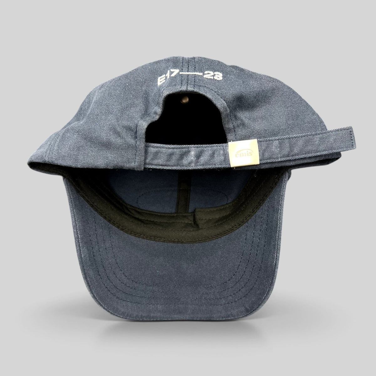 Raree Finds navy cotton strapback hat by EMIS with adjustable strap and branded metal clasp detail