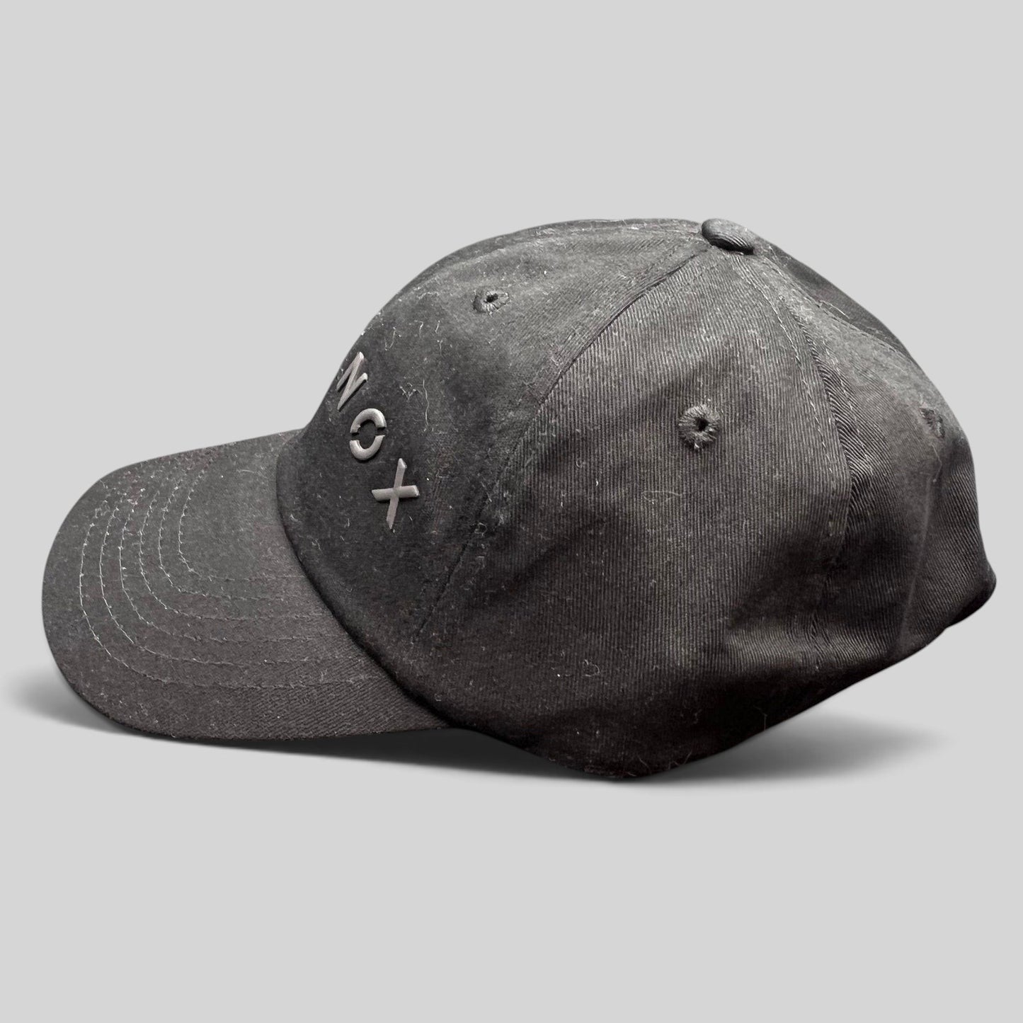 Raree Finds black Equinox fitness strapback hat with raised rubberized logo lettering and adjustable metal buckle.