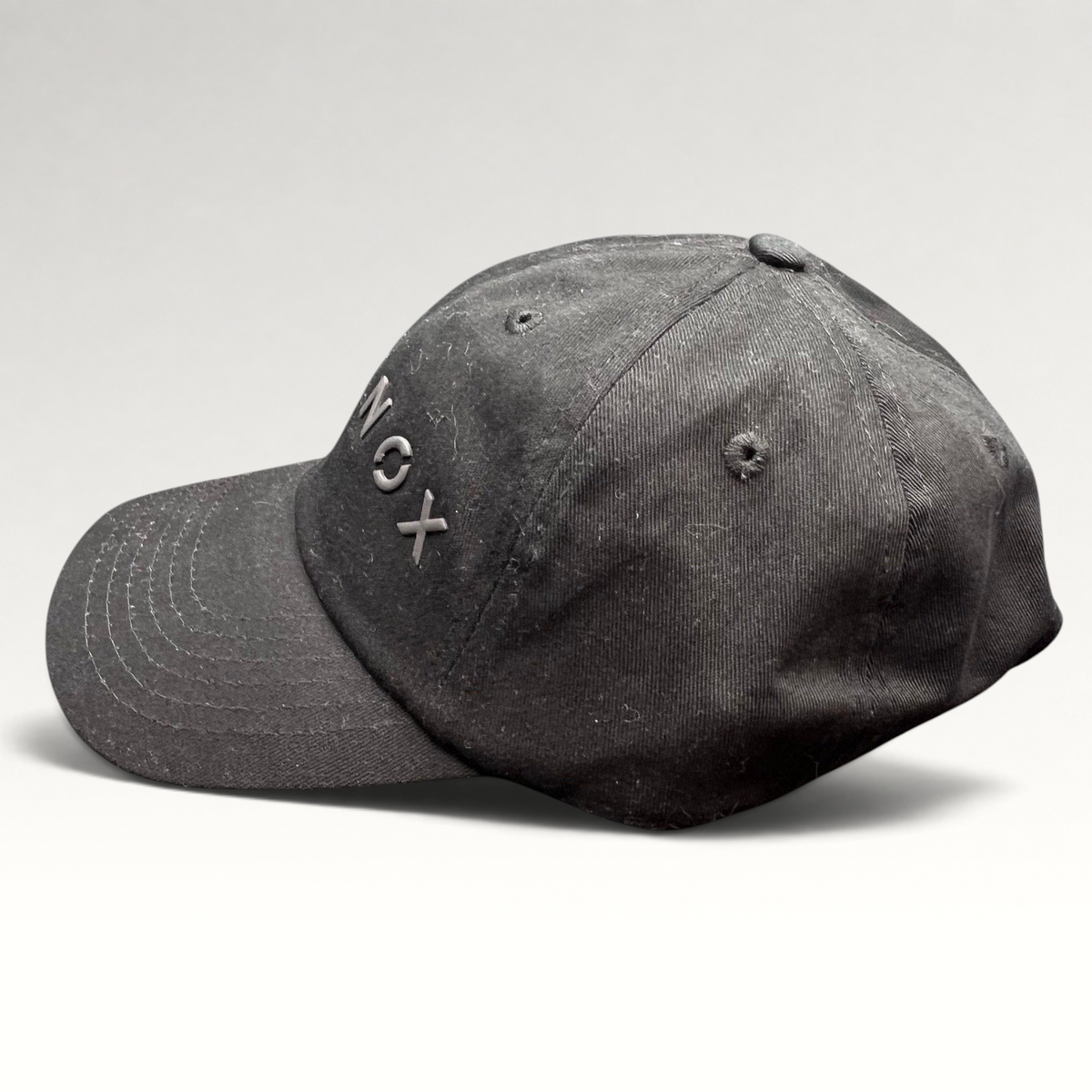 Raree Finds black Equinox fitness strapback hat with raised rubberized logo lettering and adjustable metal buckle.