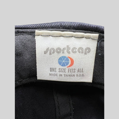Raree Finds vintage 1989 Eric Clapton tour hat interior tag showing Sportcap branding and made in Taiwan label
