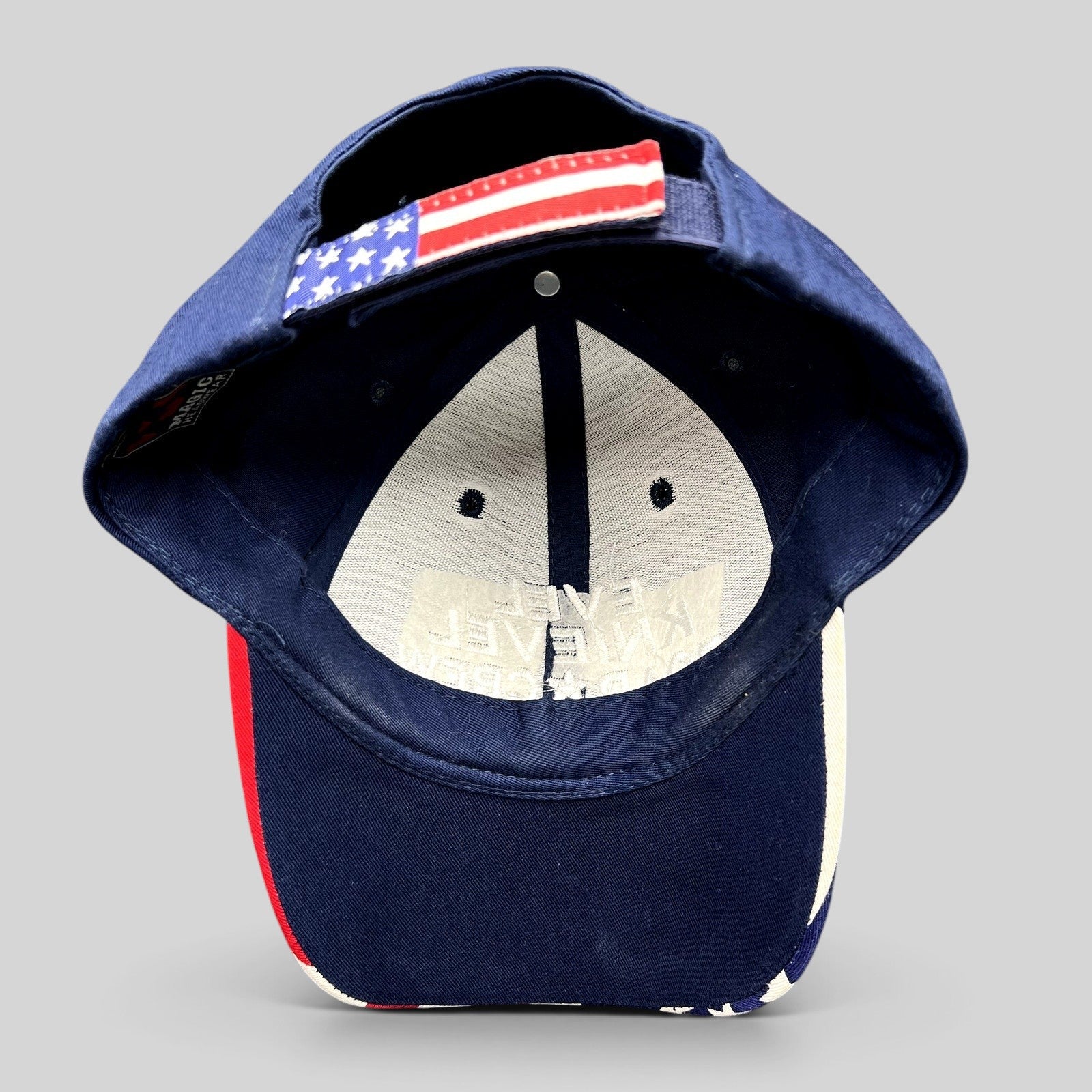 Raree Finds Y2K Evel Knievel strapback hat with navy crown and American flag print adjustable hook-and-loop strap