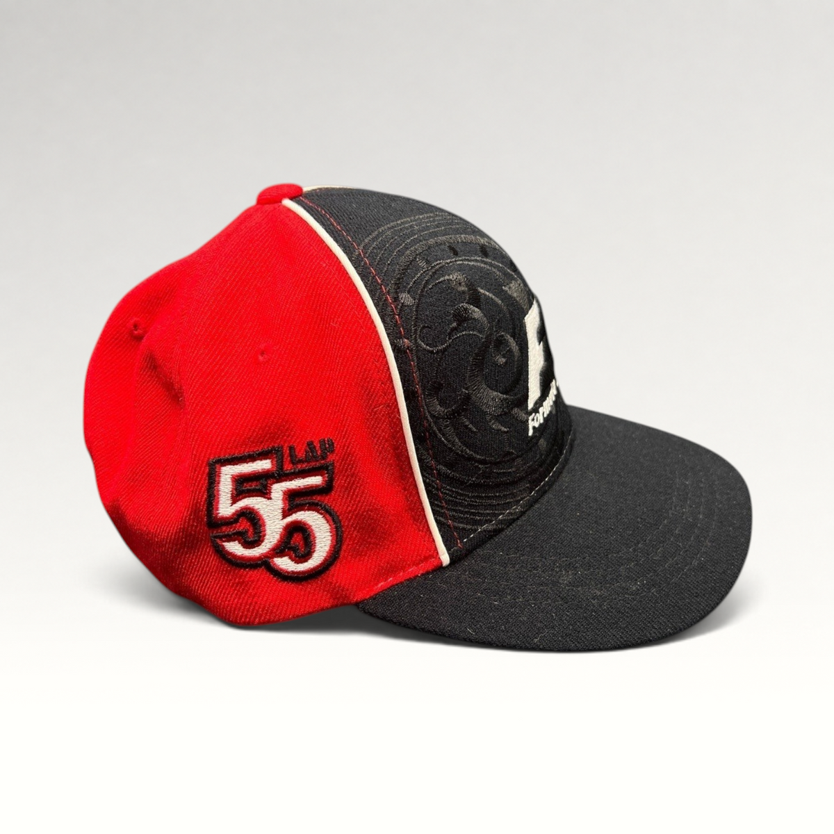 Raree Finds 2013 Formula 1 Korean Grand Prix 1st Place snapback hat in black and red with embroidered 55 lap detail.