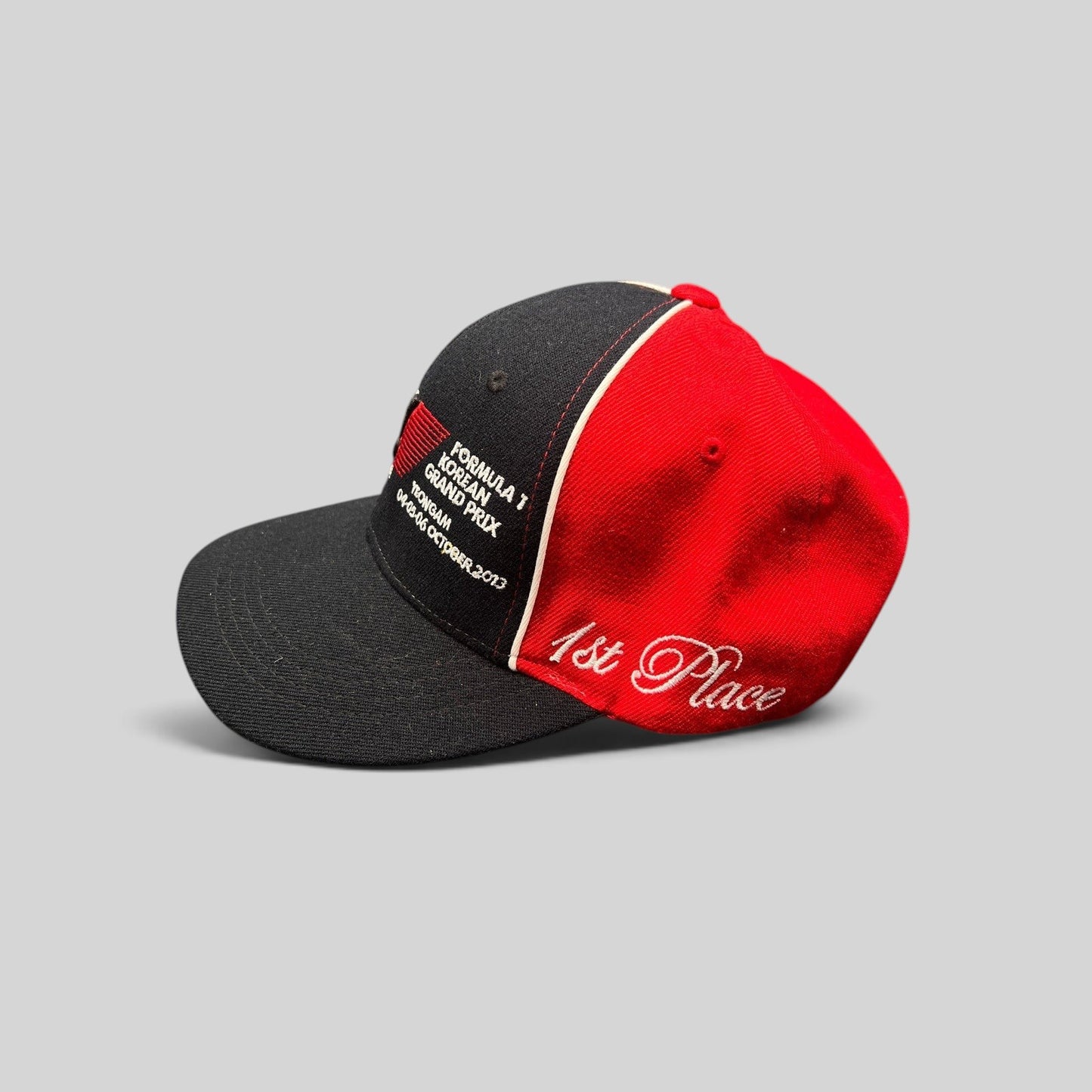Raree Finds 2013 Formula 1 Korean Grand Prix 1st Place snapback hat in black and red cotton with white embroidery.