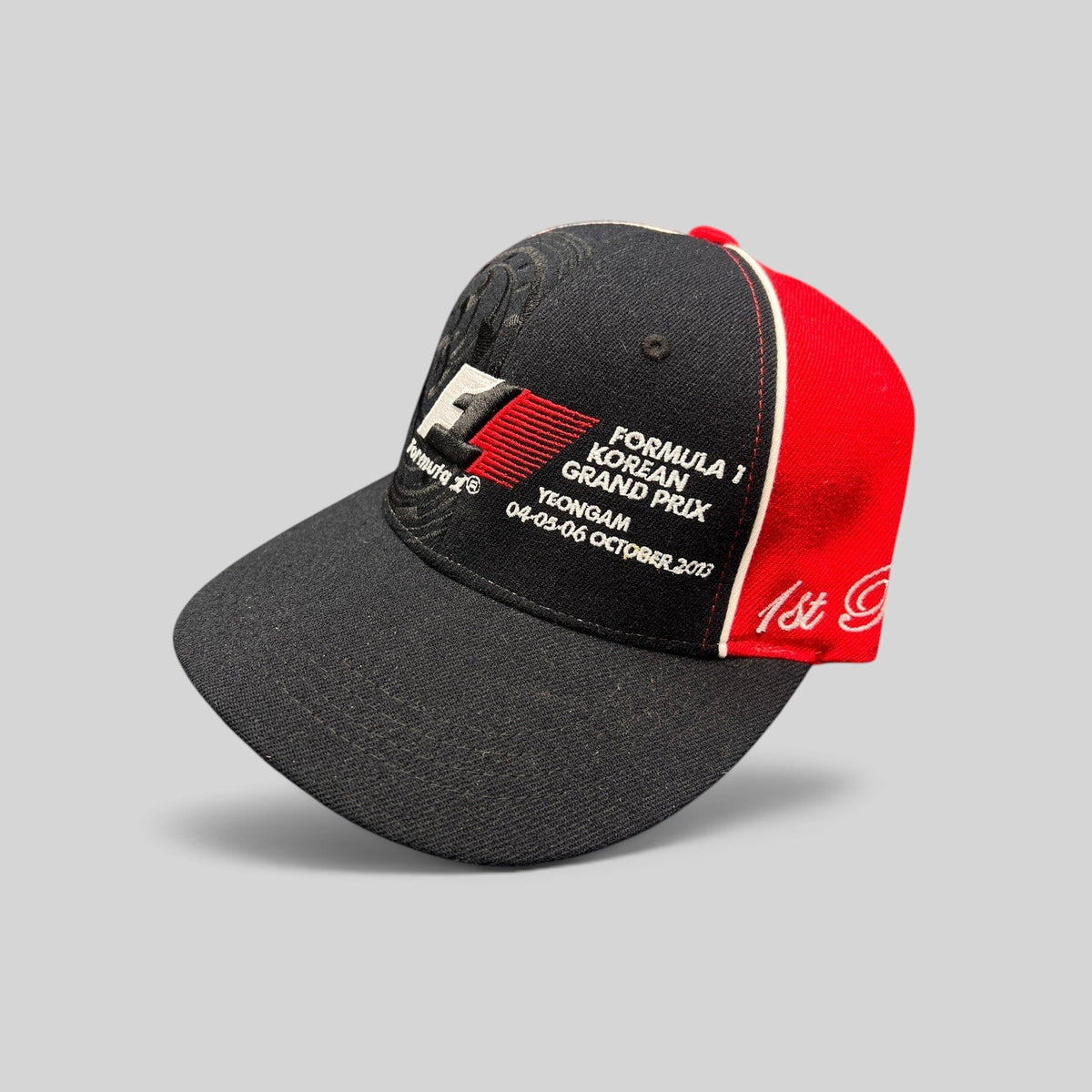 Raree Finds 2013 Formula 1 Korean Grand Prix 1st Place snapback hat in black and red cotton with embroidered details.