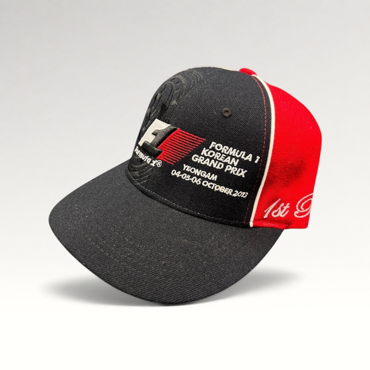 Raree Finds 2013 Formula 1 Korean Grand Prix 1st Place snapback hat in black and red cotton with embroidered details.