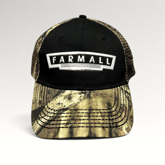 Raree Finds Farmall trucker hat with black cotton crown, camouflage brim, mesh back, and raised metallic logo patch.