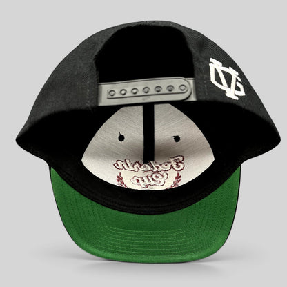 Raree Finds Fedorin Cup hockey snapback hat showing the rear adjustable strap, white logo embroidery, and green brim.