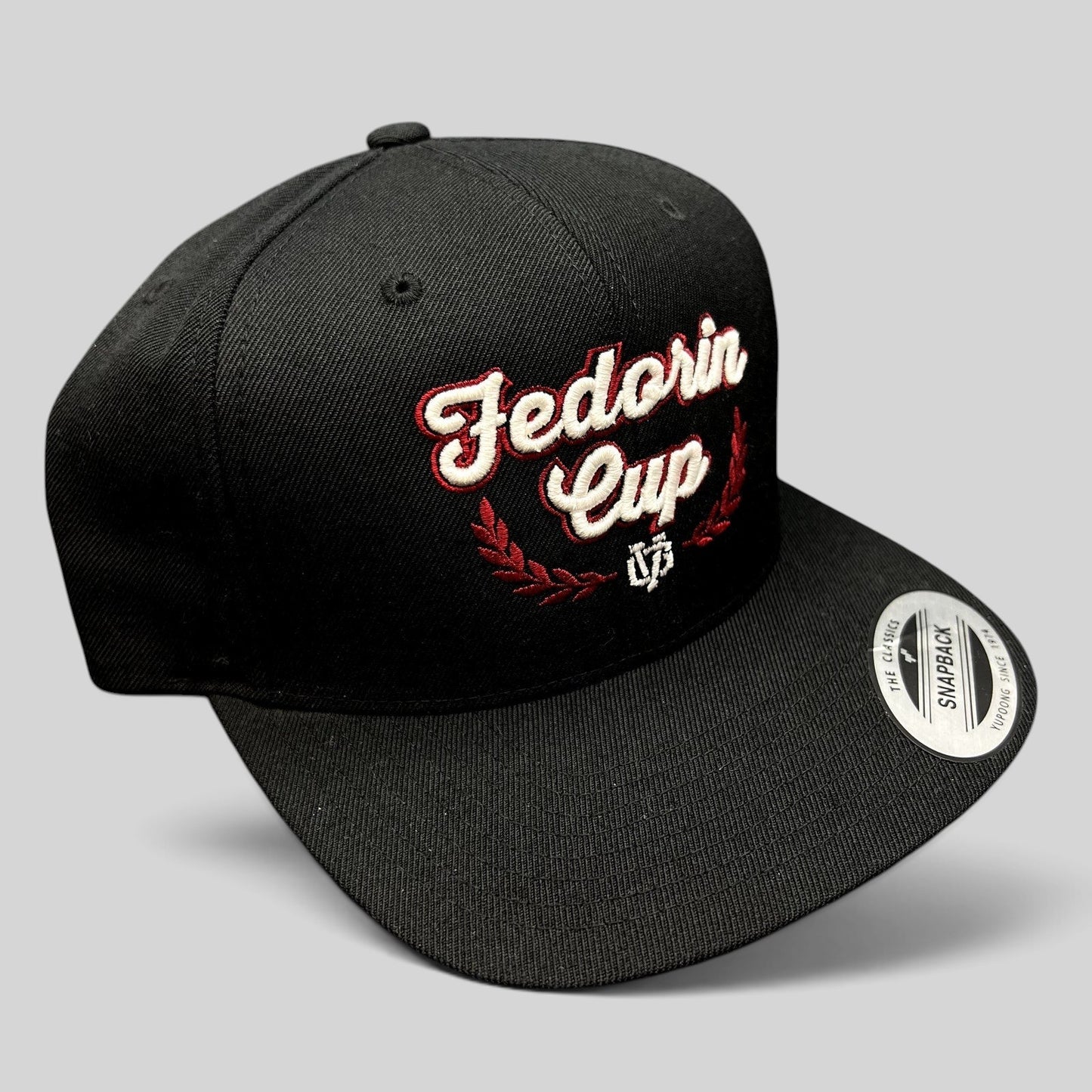 Raree Finds Fedorin Cup hockey snapback hat in black with red and white embroidered script logo and laurel accents.