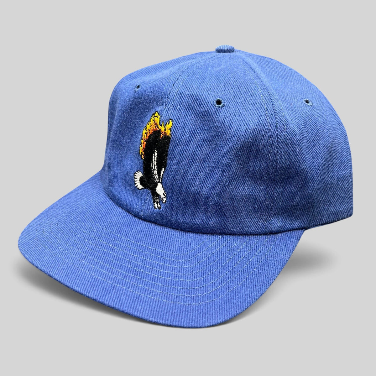Raree Finds vintage 1998 Firestorm movie crew hat in royal blue with embroidered flaming eagle graphic