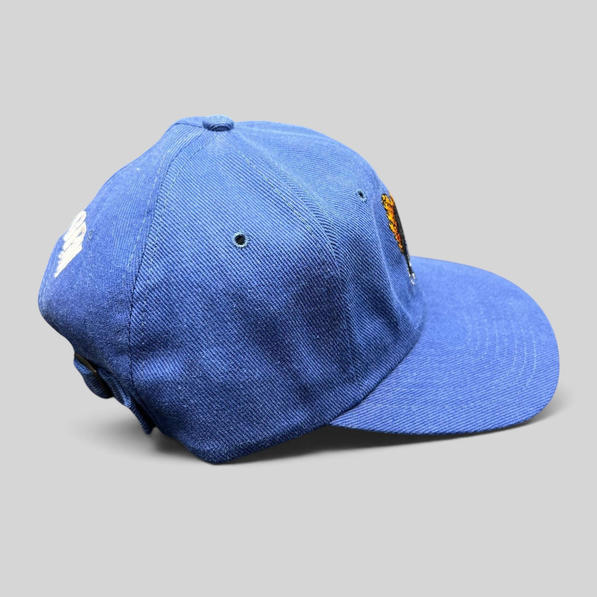 Raree Finds vintage 1998 Firestorm movie cast and crew royal blue strapback hat with embroidered flaming eagle graphic