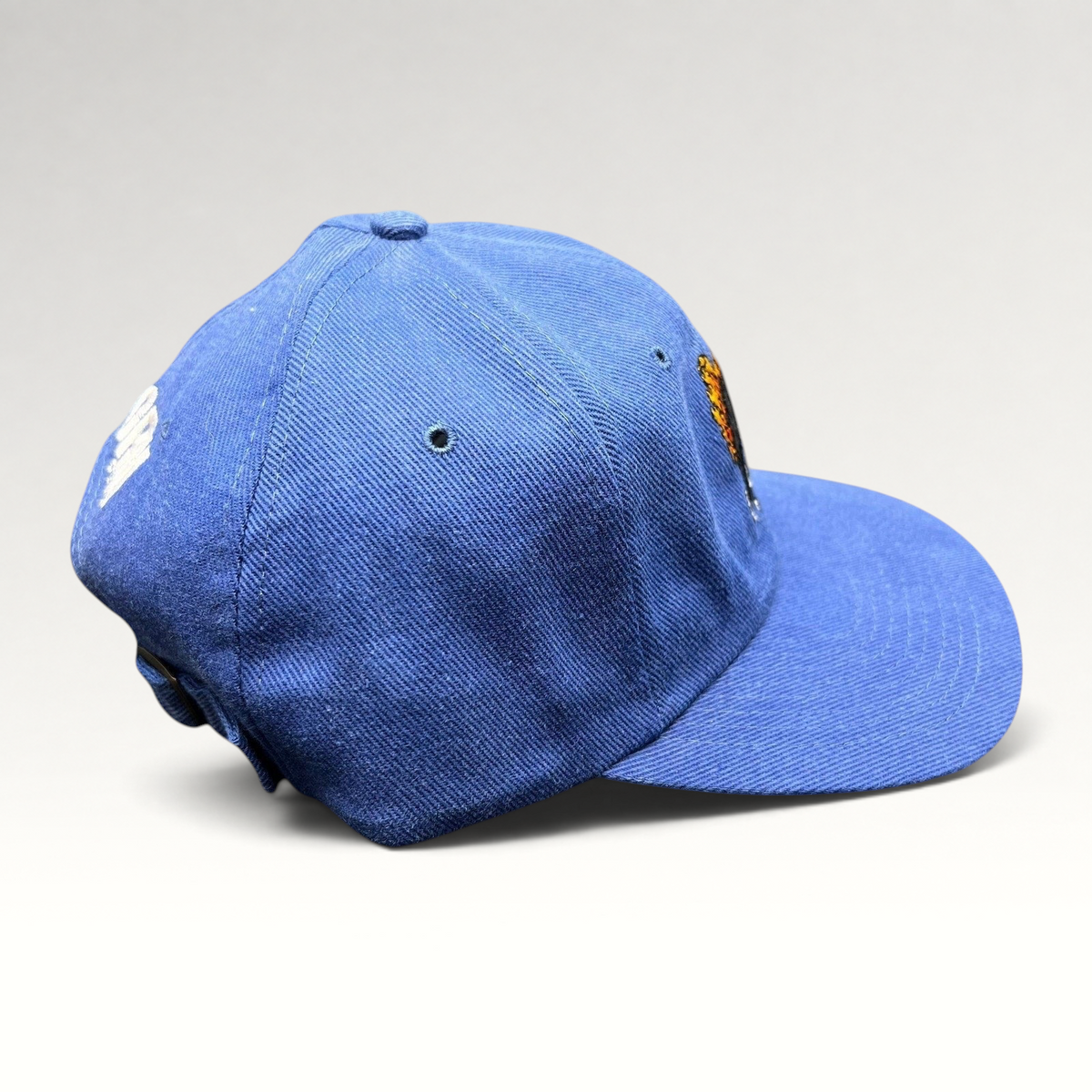 Raree Finds vintage 1998 Firestorm movie cast and crew royal blue strapback hat with embroidered flaming eagle graphic