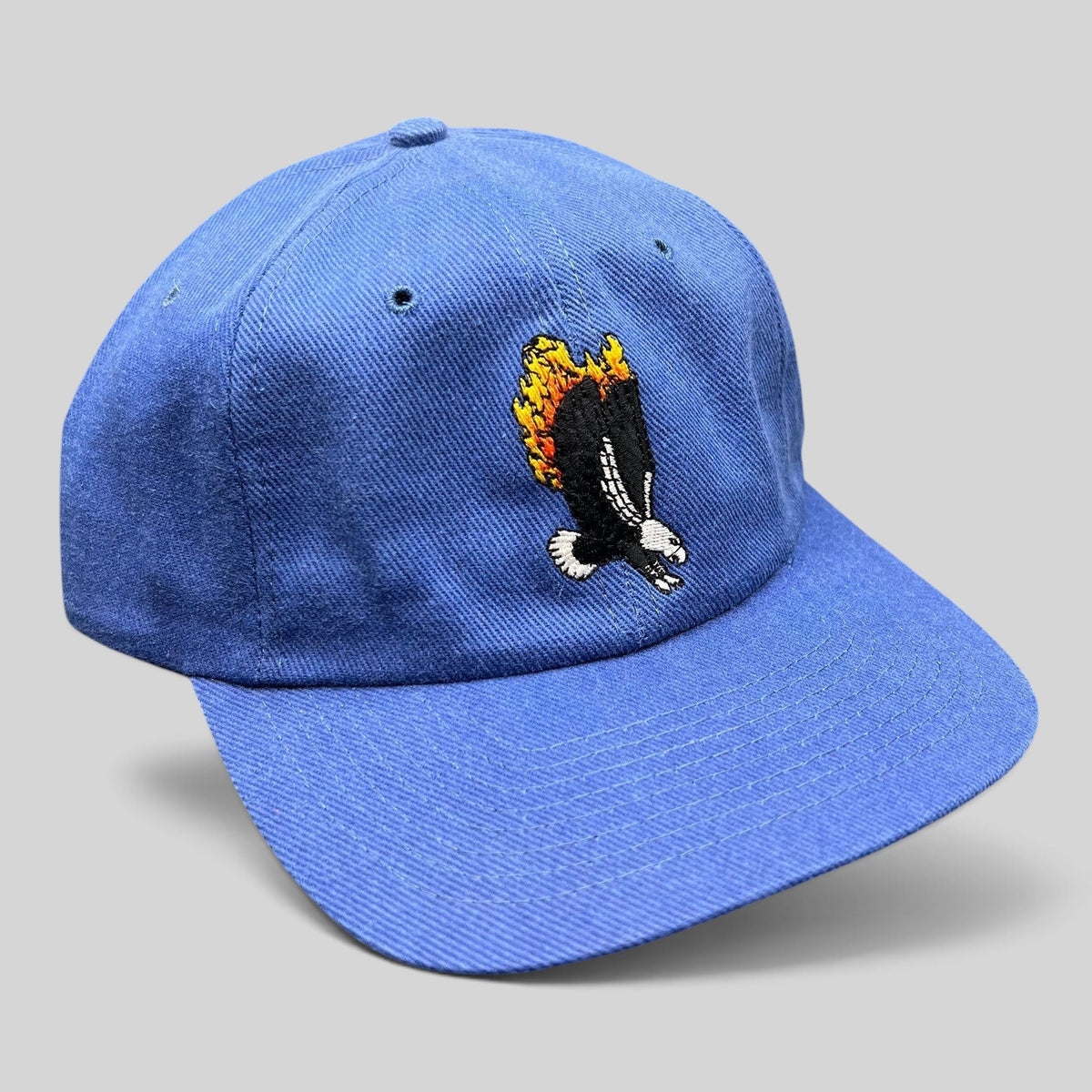 Raree Finds vintage 1998 Firestorm movie cast and crew royal blue strapback hat with flaming eagle embroidery