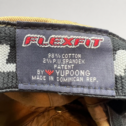 Raree Finds Flexfit hat interior label showing cotton spandex material composition and Yupoong manufacturing details