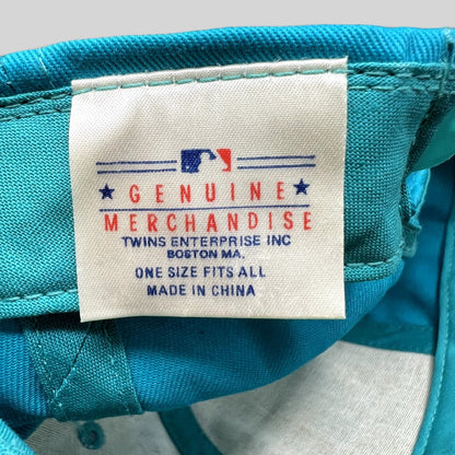 Raree Finds vintage Florida Marlins snapback hat interior label showing MLB Genuine Merchandise and Twins Enterprise