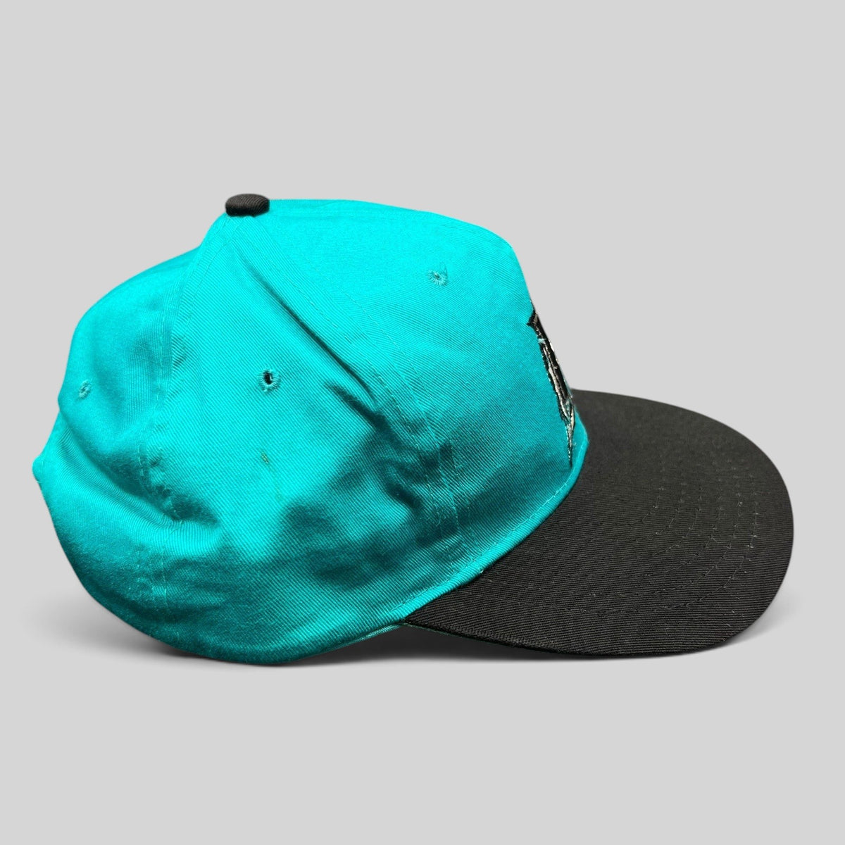 Raree Finds vintage Florida Marlins youth snapback cap in teal with a black brim and embroidered team logo.