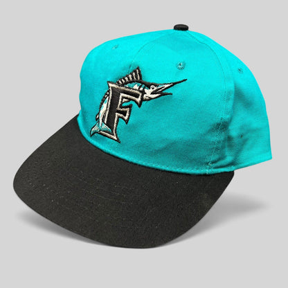 Raree Finds vintage Florida Marlins youth snapback cap with teal crown, black brim, and embroidered marlin logo