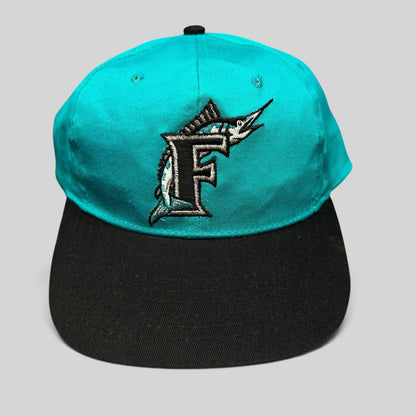 Raree Finds vintage Florida Marlins youth snapback cap with teal crown, black brim, and embroidered marlin F logo.
