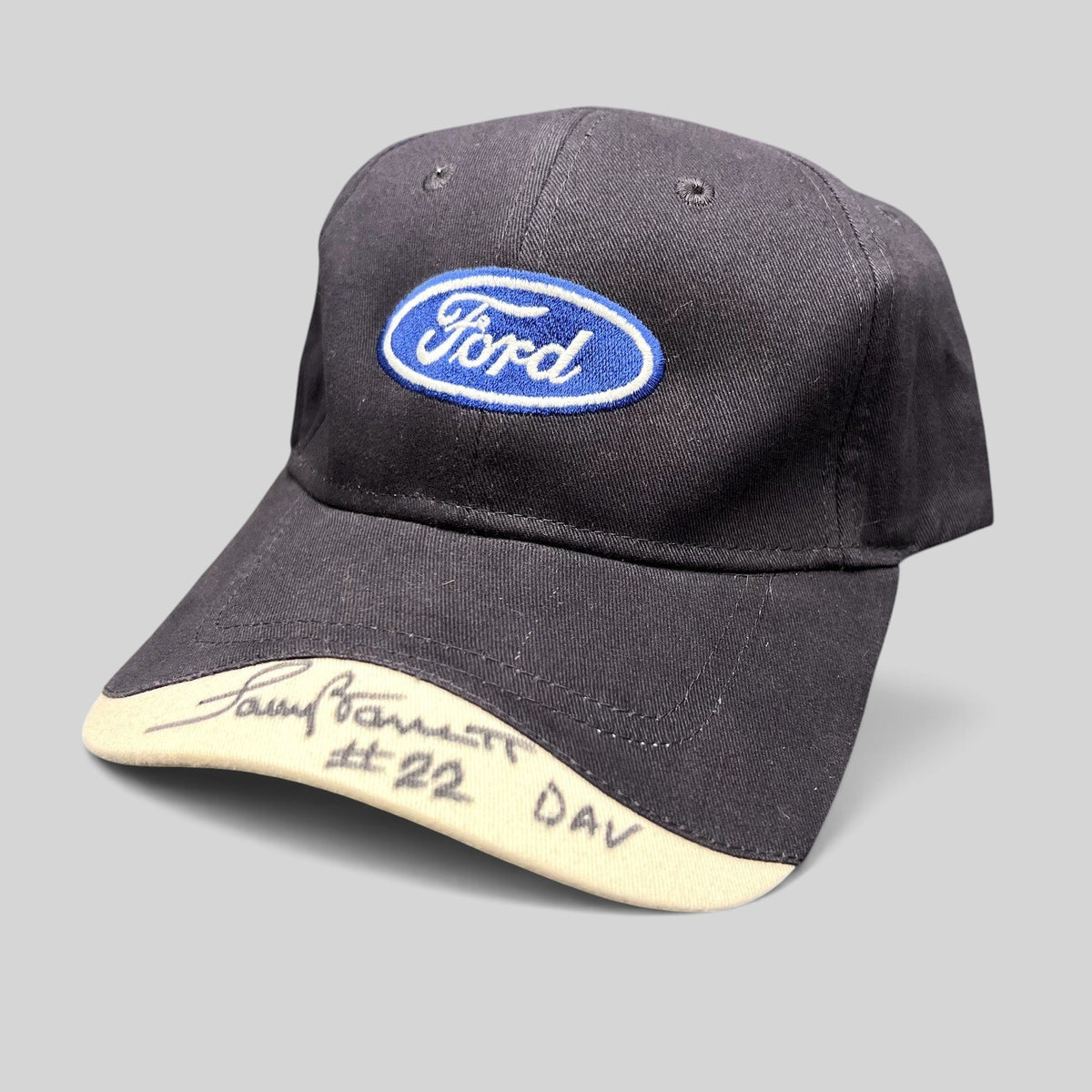 Raree Finds navy and cream Ford oval logo strapback hat by Cap America with a signed brim reading #22 DAV.