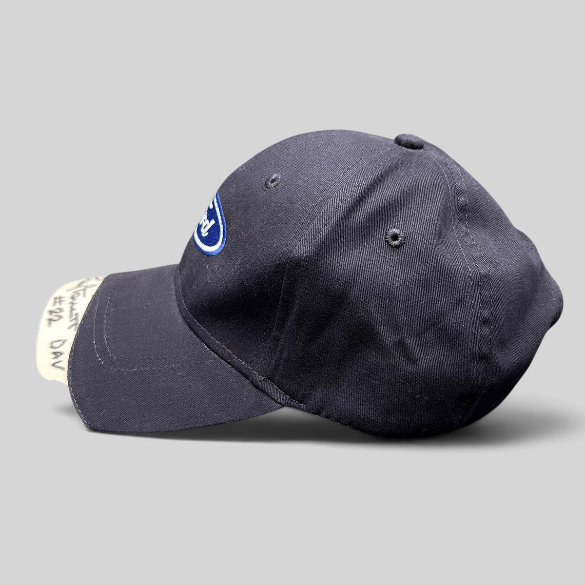 Raree Finds navy and cream Ford oval logo strapback hat by Cap America with a signed brim reading #22 DAV